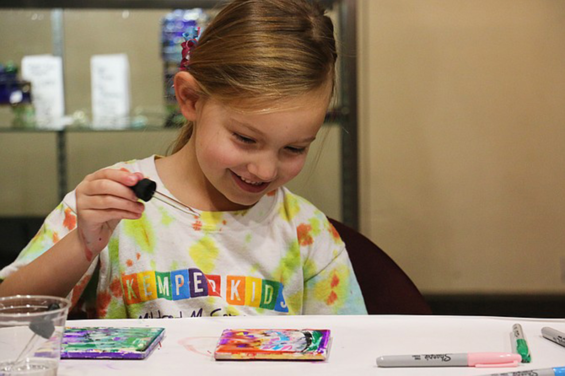 Brooklyn Keller, 5, works on an art project.