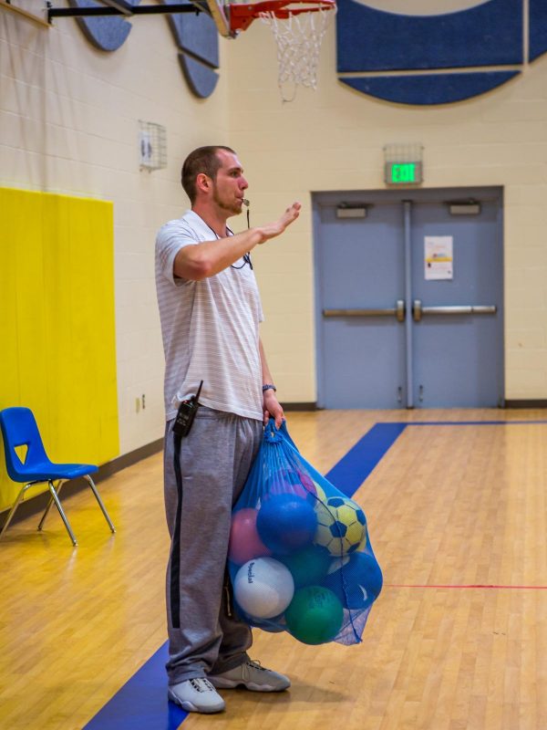 Photoshoot featuring PE alum, Dillon Shoemaker at Alpha Hart Lewis Elementary School in Columbia